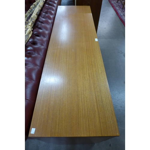 55 - An Austin Suite teak desk