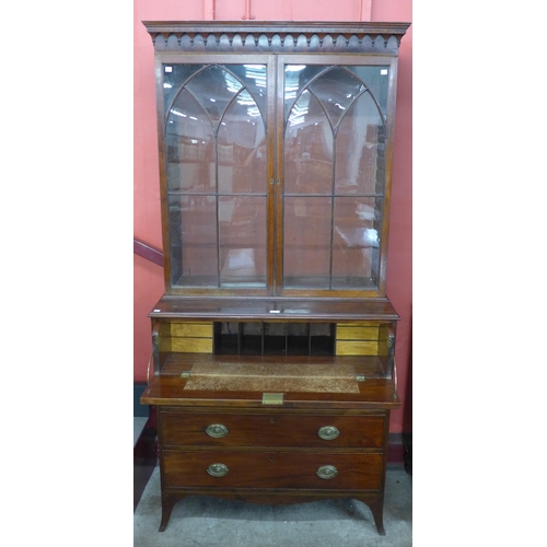 6 - A Regency inlaid mahogany secretaire bookcase