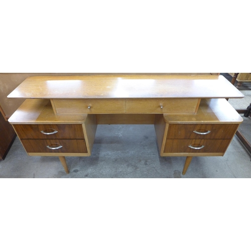 64 - An Austin Suite oak and walnut dressing table