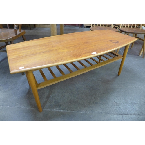 67 - A teak coffee table