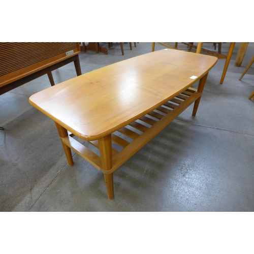 68 - A teak coffee table