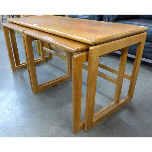 69 - A teak nest of tables