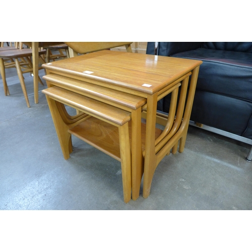 70 - A teak nest of tables