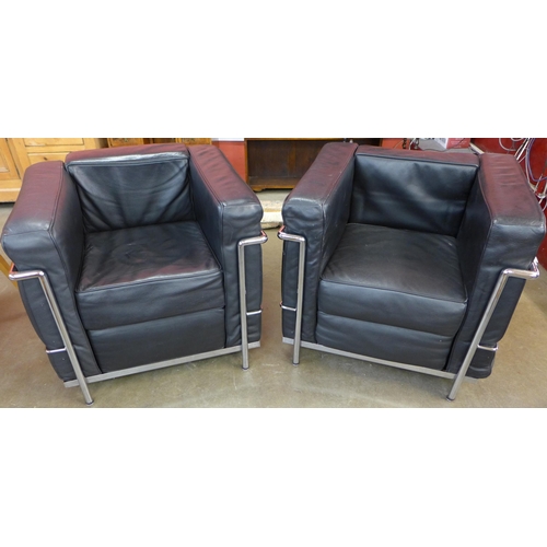 71 - A pair of Bauhaus style black leather and chrome LC2 armchairs, manner of Le Curbosier