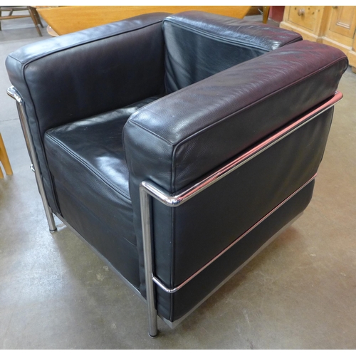 71 - A pair of Bauhaus style black leather and chrome LC2 armchairs, manner of Le Curbosier