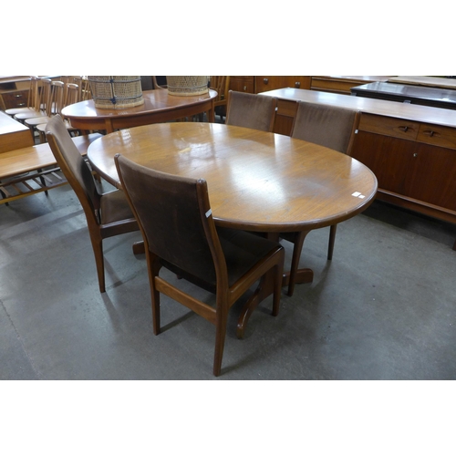 76 - A G-Plan Fresco teak extending dining table and five chairs