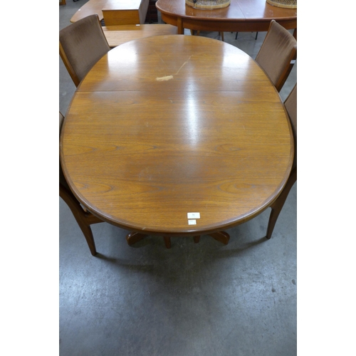 76 - A G-Plan Fresco teak extending dining table and five chairs