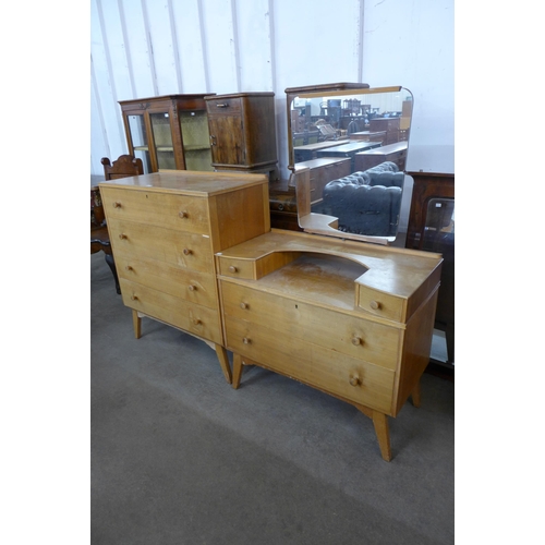 79 - A birch chest of drawers and dressing table