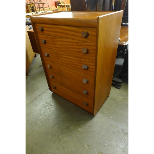 81 - A teak chest of drawers