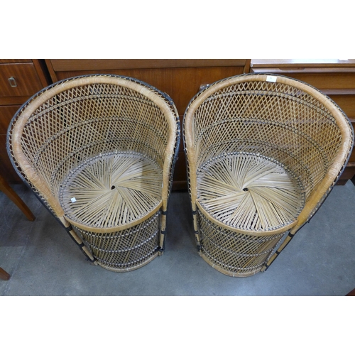 84 - A pair of Italian wicker peacock chairs