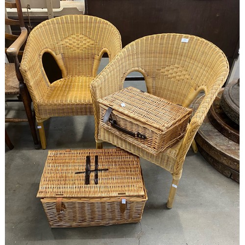 236 - Two wicker armchairs and two baskets