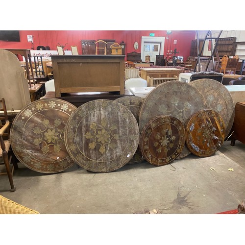 237 - Seven French style hardwood and brass inlaid circular table tops and four bases