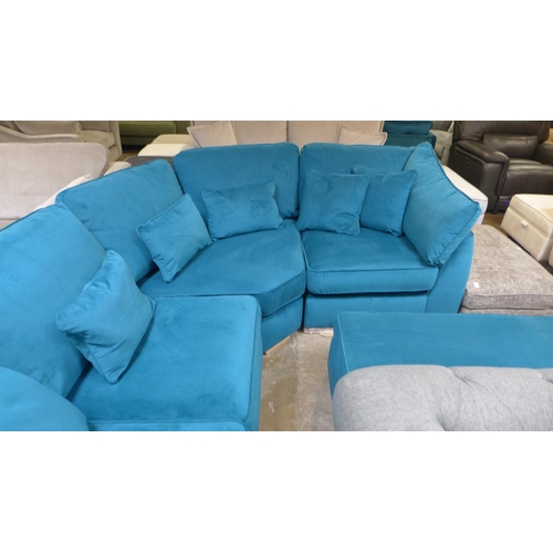 1319 - A Barker and Stonehouse ultramarine velvet curved corner sofa with large rectangular cushioned top f... 