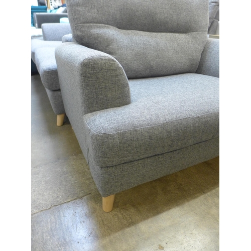 1331 - A pair of grey upholstered two seater sofas and armchair