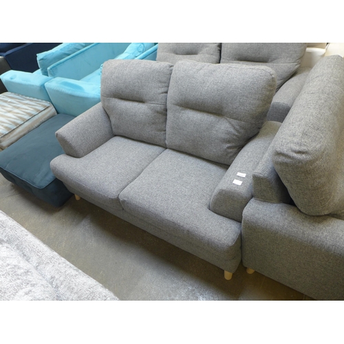 1331 - A pair of grey upholstered two seater sofas and armchair