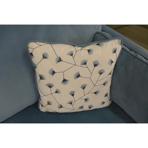 1343 - A diamond blue velvet 2.5 seater sofa with floral scatter cushions