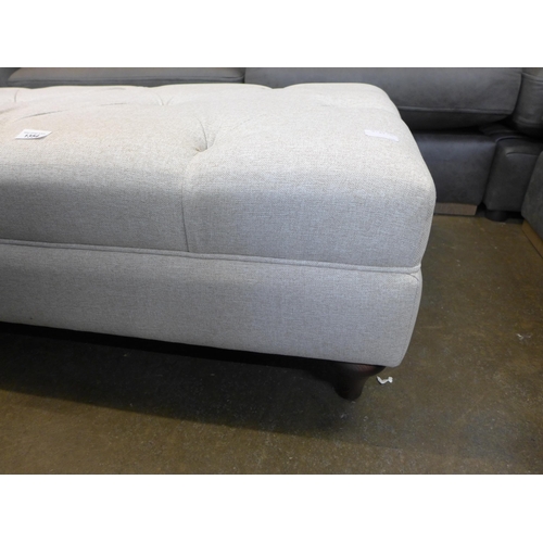 1354 - A cream upholstered button top ottoman footstool