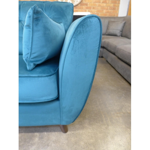 1355 - A Hoxton teal velvet three seater sofa