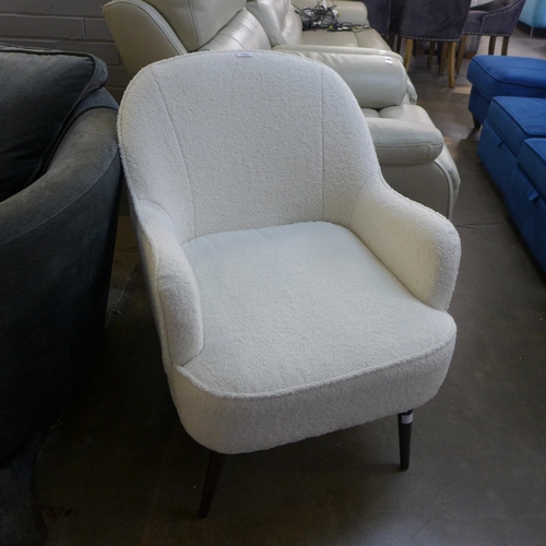 1302 - An ice white Teddy bear upholstered side chair