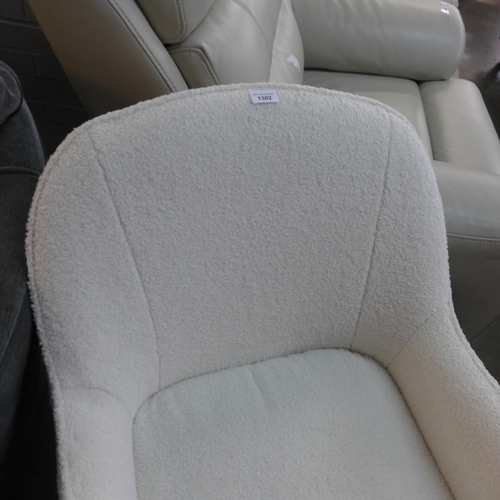 1302 - An ice white Teddy bear upholstered side chair