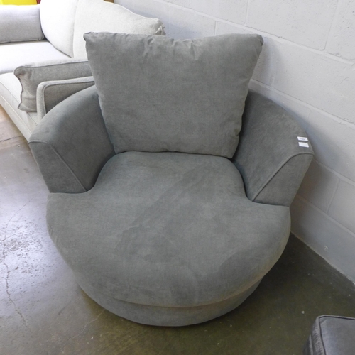 1304 - A fossil grey upholstered swivel love seat