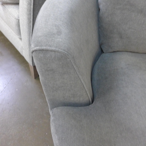 1304 - A fossil grey upholstered swivel love seat