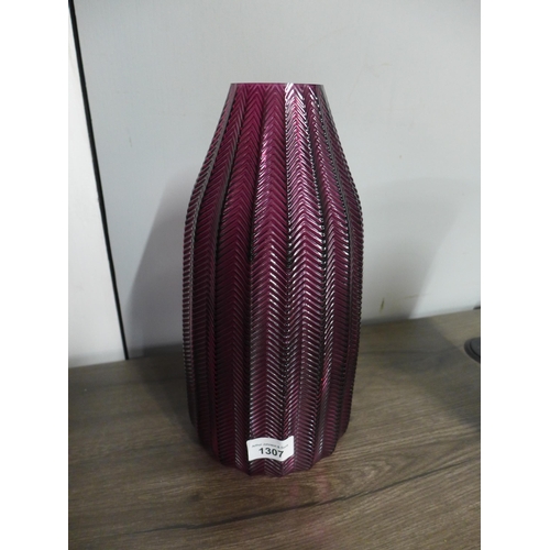 1307 - A raspberry rippled glass vase