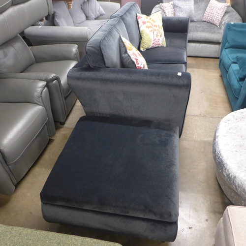 1308 - A carbon metallic upholstered 2.5 sofa with scatter cushions and ottoman foot stool