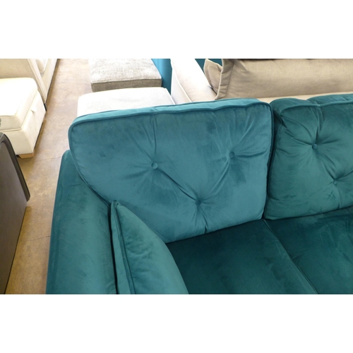 1315 - A Hoxton teal velvet two seater sofa - odd cushion