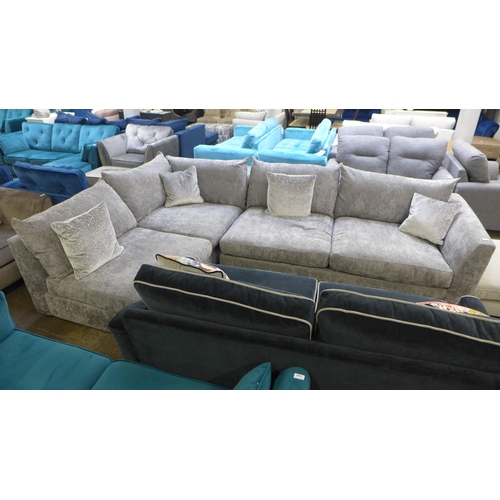 1337 - A large grey textured velvet corner sofa with patterned scatter cushions