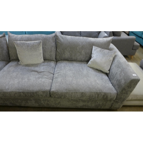 1337 - A large grey textured velvet corner sofa with patterned scatter cushions