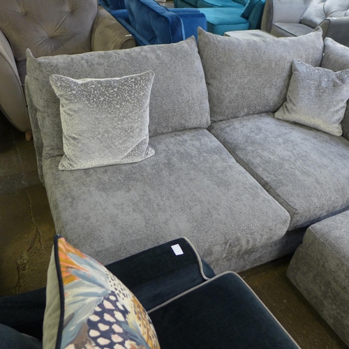 1337 - A large grey textured velvet corner sofa with patterned scatter cushions