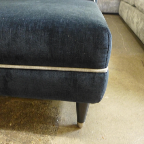 1338 - A Liberty black and light grey piping upholstered three seater sofa with matching footstool