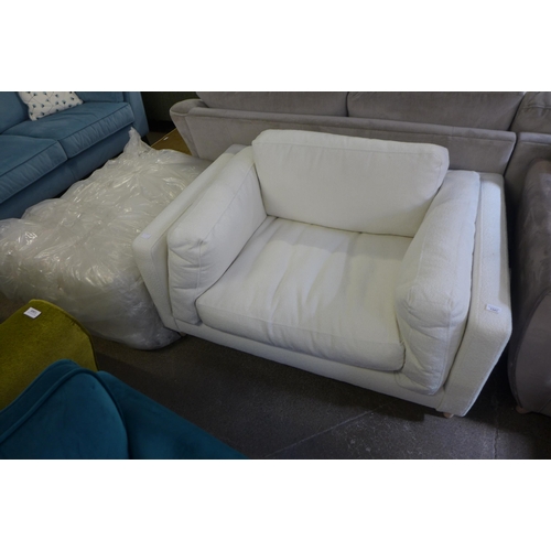 1341 - An ice white Teddy bear upholstered love seat and foot stool