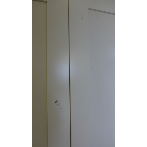 1350 - A white painted large four door full hanging wardrobe, marked  *This lot is subject to VAT