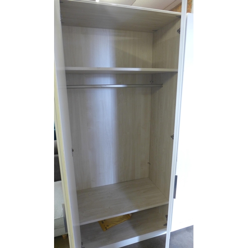 1350 - A white painted large four door full hanging wardrobe, marked  *This lot is subject to VAT