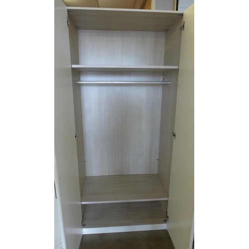 1350 - A white painted large four door full hanging wardrobe, marked  *This lot is subject to VAT