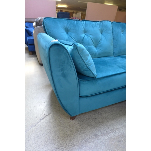 1368 - A Hoxton teal velvet three seater sofa