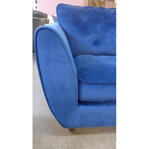 1380 - A Hoxton deep blue velvet three seater sofa