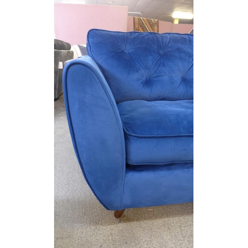 1381 - A Hoxton deep blue velvet three seater sofa