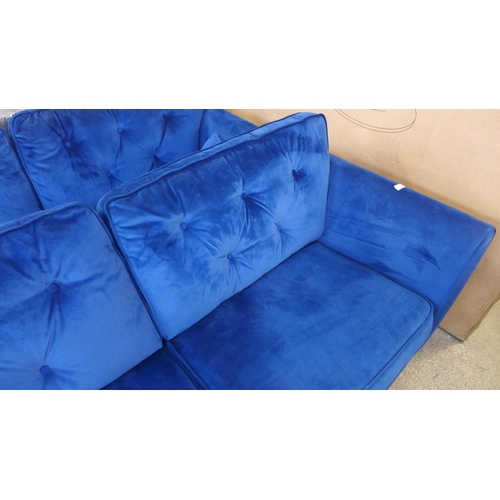 1381 - A Hoxton deep blue velvet three seater sofa