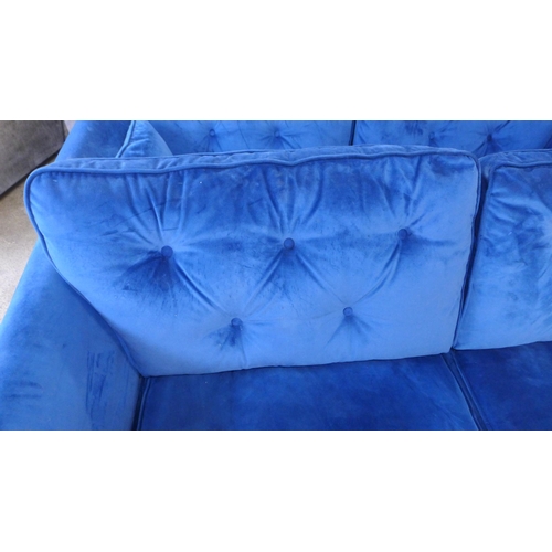 1381 - A Hoxton deep blue velvet three seater sofa