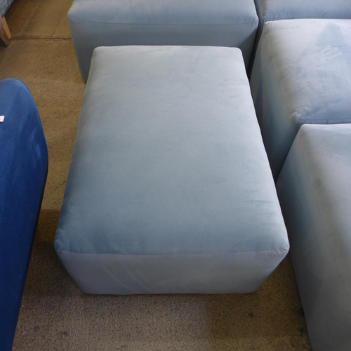 1382 - A sky blue velvet sectional corner sofa and footstool