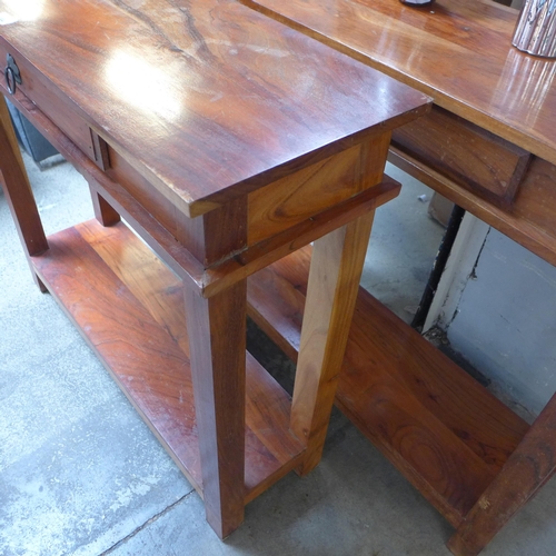 1594 - A pair of hardwood single drawer console tables