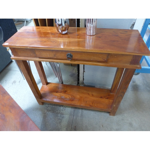 1594 - A pair of hardwood single drawer console tables