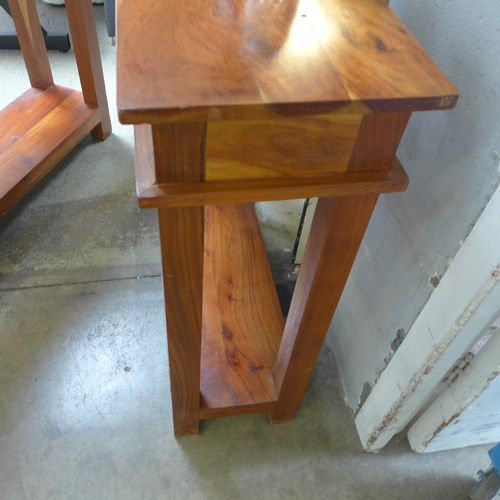 1594 - A pair of hardwood single drawer console tables