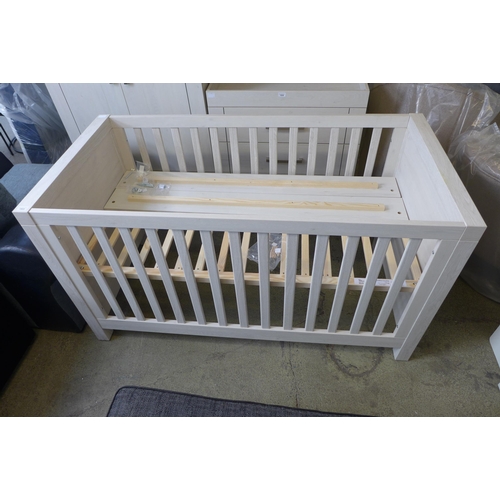 1533 - An ash effect cot bed  * This lot is subject to VAT