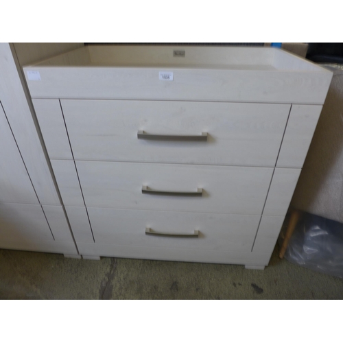 1535 - An ash effect three drawer chest of drawers  *  This lot is subject to VAT