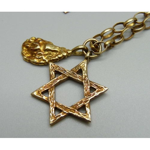 951 - A 9ct gold chain, Star of David pendant, cross pendant and one other 9ct gold pendant, 12.8g