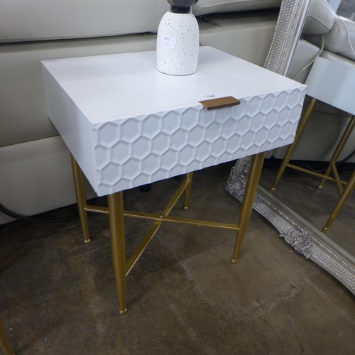 1314 - A white bedside table with gold legs
